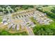 Aerial view of a well-maintained neighborhood showcasing tidy streets, green lawns, and harmonious home exteriors at 1313 Forkhorn Dr, Monroe, NC 28110