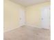 Neutral bedroom featuring carpeted floor and two white doors, providing a blank canvas ready for personalization at 1313 Forkhorn Dr, Monroe, NC 28110