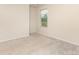 Bright bedroom featuring a window with blinds, offering natural light and privacy, perfect for rest and relaxation at 1313 Forkhorn Dr, Monroe, NC 28110