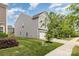 This home boasts a well-maintained lawn and a two-car garage with extra yard space at 1313 Forkhorn Dr, Monroe, NC 28110