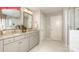 Bathroom featuring double sinks with granite countertops, neutral walls, with a separate shower and toilet area at 146 Ventor Way, Mooresville, NC 28115