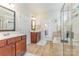 This bathroom features a double vanity, walk in shower, and separate water closet at 2035 Moultrie Ct, Fort Mill, SC 29707