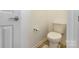 This half-bathroom features a ceramic toilet and tile floor at 2035 Moultrie Ct, Fort Mill, SC 29707