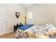This bedroom features shuttered windows and a vintage clock at 2035 Moultrie Ct, Fort Mill, SC 29707