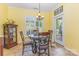 Eat-in kitchen area with stylish chairs, modern lighting, and a view of the outdoors at 2035 Moultrie Ct, Fort Mill, SC 29707