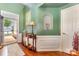 Inviting foyer with hardwood floors, wainscoting, and a view of the outdoors at 2035 Moultrie Ct, Fort Mill, SC 29707