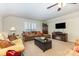 Cozy living room featuring neutral walls, recessed lighting, and an entertainment center at 2035 Moultrie Ct, Fort Mill, SC 29707