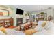 Cozy living room featuring a fireplace, hardwood floors, and comfortable seating at 2035 Moultrie Ct, Fort Mill, SC 29707