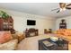 Inviting living room featuring an entertainment center, fireplace, and comfortable seating at 2035 Moultrie Ct, Fort Mill, SC 29707
