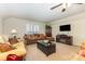 Cozy living room featuring neutral walls, recessed lighting, and an entertainment center at 2035 Moultrie Ct, Fort Mill, SC 29707