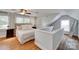 Bedroom with ceiling fan, hardwood floors, and neutral color palette at 2124 Chambwood Dr, Charlotte, NC 28205