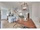 Open living space showcasing a kitchen, dining area, staircase, and a comfortable seating area at 2124 Chambwood Dr, Charlotte, NC 28205