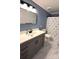 This bathroom features a single sink, vanity, and marble floors at 2330 Winthorp Ridge Rd, Charlotte, NC 28270
