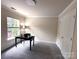 This bedroom features carpet and a desk at 2330 Winthorp Ridge Rd, Charlotte, NC 28270