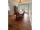 Dining room with a table, chairs, hardwood flooring, and ample natural light at 2330 Winthorp Ridge Rd, Charlotte, NC 28270