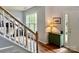 Sunlit entryway with hardwood floors, white trim, and decorative accents at 2330 Winthorp Ridge Rd, Charlotte, NC 28270