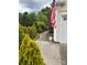 This home features mature landscaping at 2330 Winthorp Ridge Rd, Charlotte, NC 28270