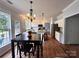 Spacious kitchen with island, stainless appliances, and adjacent dining area at 2330 Winthorp Ridge Rd, Charlotte, NC 28270