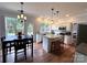 Bright kitchen with an island, pendant lighting, and an open layout at 2330 Winthorp Ridge Rd, Charlotte, NC 28270