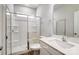 Clean bathroom with a glass-enclosed shower and modern vanity at 2522 Mabel Ln, Monroe, NC 28110