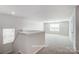 Upstairs bonus room with lots of natural light from two large windows at 2522 Mabel Ln, Monroe, NC 28110