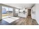 Bright kitchen features modern appliances, white cabinets, a large island, and sliding glass doors at 2522 Mabel Ln, Monroe, NC 28110