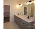 Bathroom features double vanity and walk-in closet at 3011 Buffett Ln # 33, Monroe, NC 28110