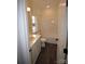 Bright bathroom features a tub and shower combination and a single sink with natural light at 3011 Buffett Ln # 33, Monroe, NC 28110