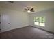 Spacious bedroom featuring a ceiling fan and large windows at 3011 Buffett Ln # 33, Monroe, NC 28110