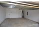 Two car garage with unfinished ceiling at 3011 Buffett Ln # 33, Monroe, NC 28110