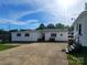 Expansive backyard features a versatile layout, tidy landscaping, and secondary garage at 309 E 11Th St, Kannapolis, NC 28083