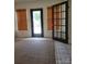 Cozy sunroom with multiple windows and bamboo shades, offering ample natural light at 309 E 11Th St, Kannapolis, NC 28083
