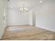 Well lit living space featuring hardwood floors, recessed lighting, and neutral paint at 3622 E Brief Rd, Monroe, NC 28110