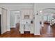 Dry bar area offers cabinet storage, granite countertops, and a wine rack for entertaining at 409 Wheatberry Hill Dr, Matthews, NC 28104