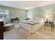 Light and airy bedroom with neutral tones and a comfortable bed at 4464 Mullens Ford Rd, Charlotte, NC 28226