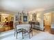 Charming dining room with chandelier, buffet, and views into other rooms at 4464 Mullens Ford Rd, Charlotte, NC 28226