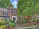 Charming brick townhome with lush landscaping and a welcoming entrance at 4464 Mullens Ford Rd, Charlotte, NC 28226
