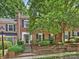 Charming brick townhome with lush landscaping and a welcoming entrance at 4464 Mullens Ford Rd, Charlotte, NC 28226
