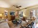 Open living room showcasing hardwood floors, access to other rooms, and comfortable seating at 4464 Mullens Ford Rd, Charlotte, NC 28226