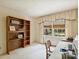Bright home office featuring built-in shelves and a window for natural light at 4464 Mullens Ford Rd, Charlotte, NC 28226