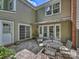 Inviting patio with outdoor seating and mature landscaping at 4464 Mullens Ford Rd, Charlotte, NC 28226