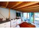 View of the outdoor kitchen with a white stove and cabinets, providing a functional cooking space at 475 Dot Faris Rd, Catawba, SC 29704