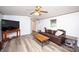 Inviting living room with cozy furniture, a ceiling fan, and natural light at 475 Dot Faris Rd, Catawba, SC 29704