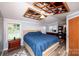 Comfortable main bedroom featuring a unique ceiling and large window for natural light at 475 Dot Faris Rd, Catawba, SC 29704
