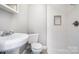 Bathroom features tiled shower with built in niche and vanity sink at 506 7Th Sw St, Hickory, NC 28602