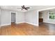 Bright living room with hardwood floors and neutral paint, showcasing open doorway at 506 7Th Sw St, Hickory, NC 28602