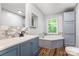 Stylish bathroom featuring a modern vanity, soaking tub, and contemporary design at 5523 Flint Ridge Church Rd, Marshville, NC 28103