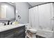 This bathroom has a modern vanity with stylish fixtures, marble countertops, and storage at 5523 Flint Ridge Church Rd, Marshville, NC 28103