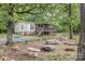 Charming home featuring a spacious deck, rock accents, and well-manicured landscaping at 5523 Flint Ridge Church Rd, Marshville, NC 28103