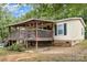 Inviting home showcasing a large deck, providing ample outdoor living space at 5523 Flint Ridge Church Rd, Marshville, NC 28103